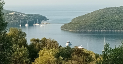 For sale a panoramic plot of 2,710.60 sq m. with two houses in Sivota, Thesprotia. 1,100,000€ (311)