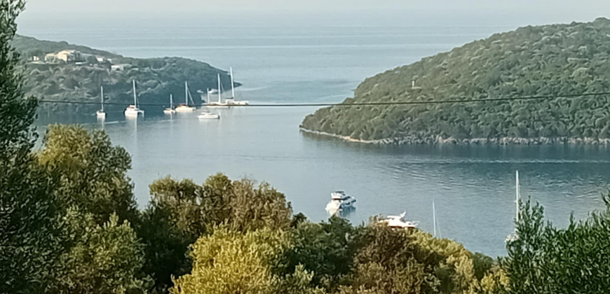 For sale a panoramic plot of 2,710.60 sq m. with two houses in Sivota, Thesprotia. 1,100,000€ (311)