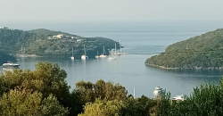 For sale a panoramic plot of 2,710.60 sq m. with two houses in Sivota, Thesprotia. 1,100,000€ (311)