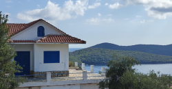 For sale a panoramic plot of 2,710.60 sq m. with two houses in Sivota, Thesprotia. 1,100,000€ (311)